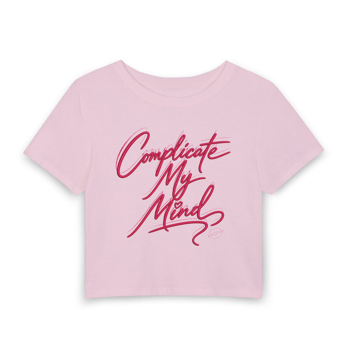 Pink crop top with red text on a white background